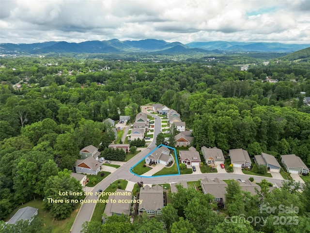 6 Meeting St, Asheville, NC 28803 - aerial perspective of suburban area featuring property boundaries highlighted, a mountainous background, and a heavily wooded area