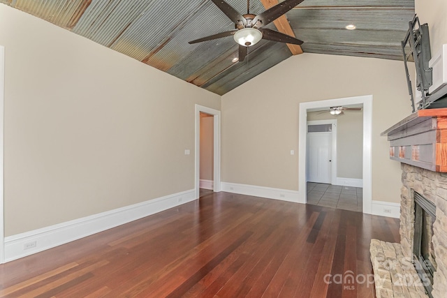 135 Waycross Dr, Rockwell, NC 28110 - unfurnished living room featuring ceiling fan, hardwood / wood-style floors, a fireplace, and baseboards