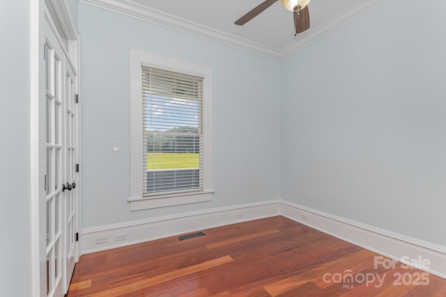 135 Waycross Dr, Rockwell, NC 28110 - empty room featuring crown molding, wood finished floors, and a ceiling fan