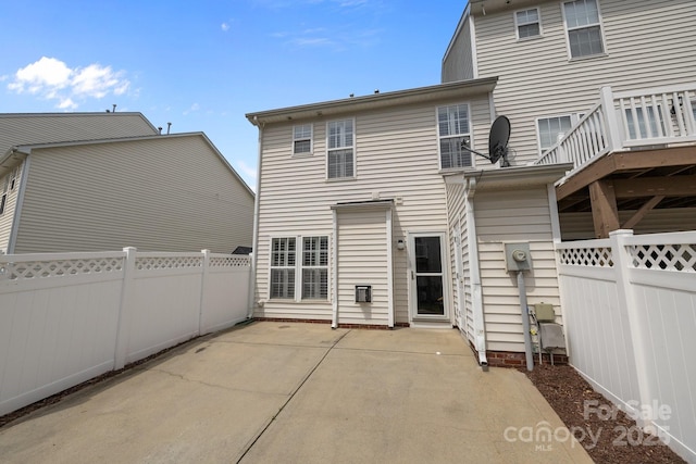 10455 Alexander Martin Ave, Charlotte, NC 28277 - rear view of house with a fenced backyard and a patio