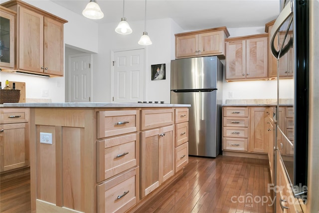 500 Cheestoonaya Way, Brevard, NC 28712 - kitchen with freestanding refrigerator, light brown cabinets, dark wood-style floors, fridge, and light stone counters