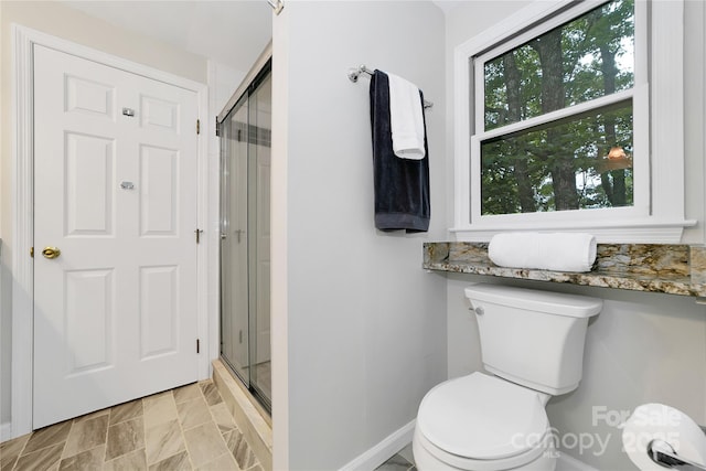 500 Cheestoonaya Way, Brevard, NC 28712 - full bathroom featuring a stall shower, toilet, and baseboards