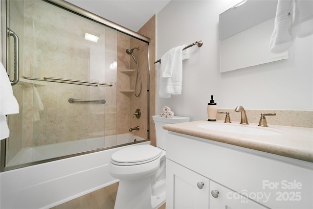 500 Cheestoonaya Way, Brevard, NC 28712 - bathroom featuring vanity, combined bath / shower with glass door, toilet, and wood finished floors