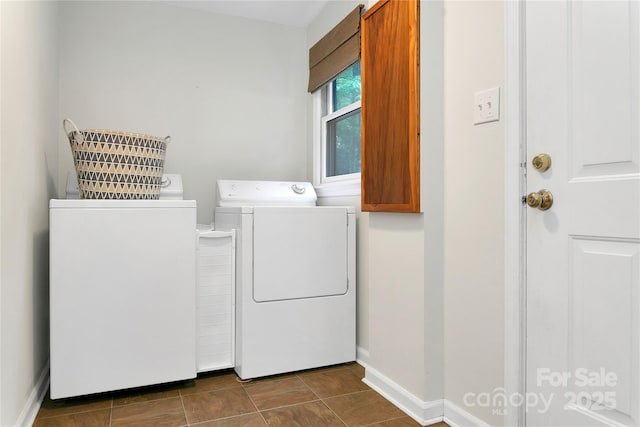 500 Cheestoonaya Way, Brevard, NC 28712 - laundry room featuring washer and clothes dryer, cabinet space, and baseboards