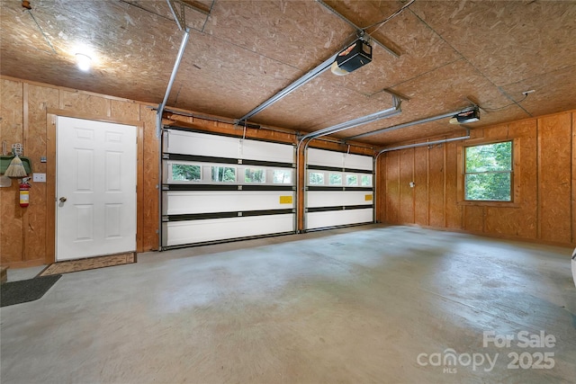 500 Cheestoonaya Way, Brevard, NC 28712 - garage with a garage door opener and wood walls