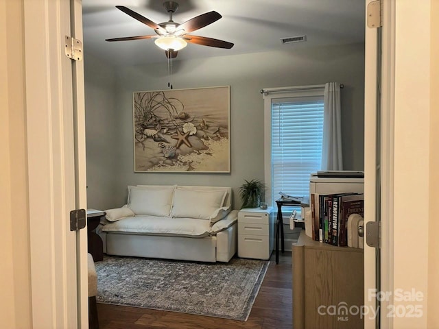 1636 Sand Harbor Cir, Ocean Isle Beach, NC 28469 - sitting room featuring ceiling fan and dark wood-style flooring