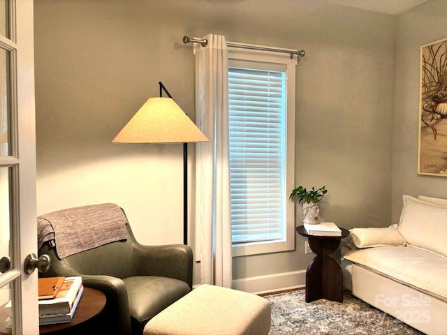 1636 Sand Harbor Cir, Ocean Isle Beach, NC 28469 - sitting room featuring baseboards and wood finished floors