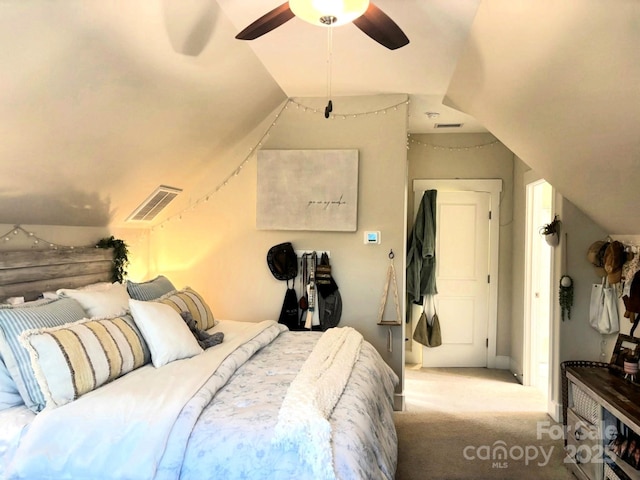 1636 Sand Harbor Cir, Ocean Isle Beach, NC 28469 - bedroom with carpet flooring, vaulted ceiling, and ceiling fan