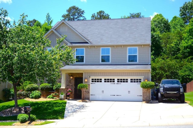 7170 Kenyon Dr, Denver, NC 28037 - craftsman inspired home with a garage, driveway, brick siding, and a front yard