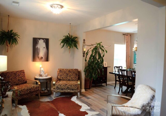 7170 Kenyon Dr, Denver, NC 28037 - sitting room with wood finished floors and baseboards