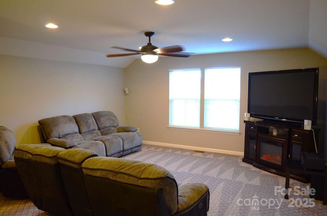 7170 Kenyon Dr, Denver, NC 28037 - carpeted living area featuring lofted ceiling, ceiling fan, baseboards, and recessed lighting