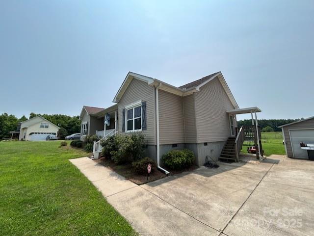 1545 Lewis Farm Rd, Kings Mountain, NC 28086 - view of property exterior with crawl space, a yard, and stairs