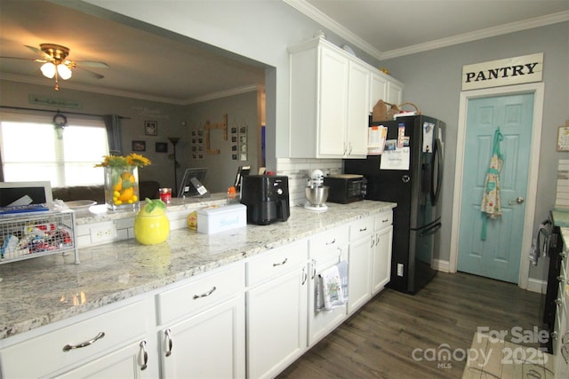 1545 Lewis Farm Rd, Kings Mountain, NC 28086 - kitchen with refrigerator with ice dispenser, white cabinetry, dark wood-type flooring, ceiling fan, and ornamental molding