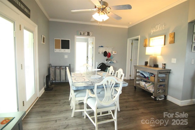 1545 Lewis Farm Rd, Kings Mountain, NC 28086 - dining room with dark wood-type flooring, a ceiling fan, crown molding, and baseboards