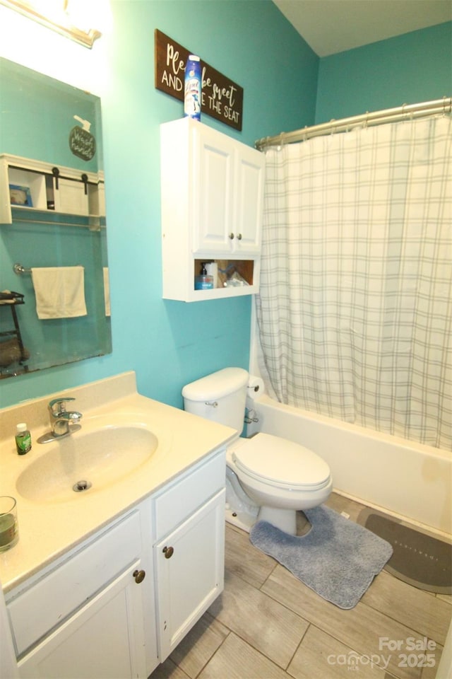 1545 Lewis Farm Rd, Kings Mountain, NC 28086 - bathroom with vanity, shower / bath combo with shower curtain, and toilet