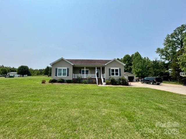 1545 Lewis Farm Rd, Kings Mountain, NC 28086 - ranch-style house featuring a porch, driveway, and a front yard