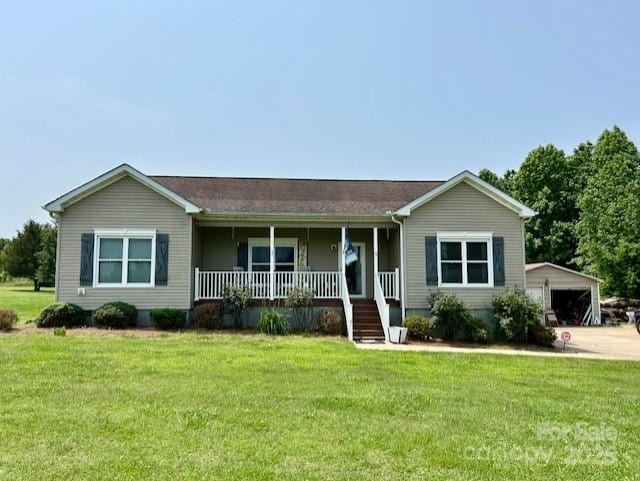 1545 Lewis Farm Rd, Kings Mountain, NC 28086 - ranch-style house featuring covered porch, an outdoor structure, a front yard, and a detached garage