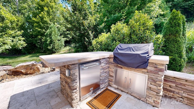 5590 Elk Knob Ct, Denver, NC 28037 - view of patio featuring an outdoor kitchen
