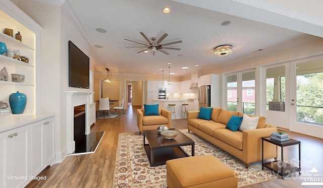 5590 Elk Knob Ct, Denver, NC 28037 - living area featuring ornamental molding, light wood-style floors, ceiling fan, recessed lighting, and a fireplace