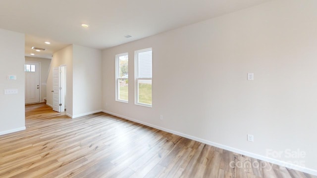 2547 Ruby Dixon Crossing Dr Unit 17, Gastonia, NC 28056 - empty room featuring light wood-type flooring, plenty of natural light, and recessed lighting