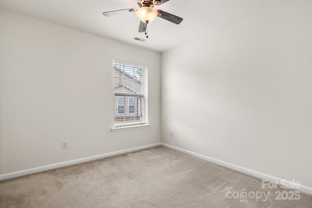 4714 Adamshire Ave, Concord, NC 28025 - carpeted spare room with baseboards and ceiling fan