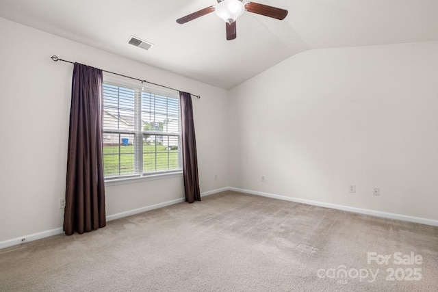 4714 Adamshire Ave, Concord, NC 28025 - carpeted spare room with vaulted ceiling, ceiling fan, and baseboards
