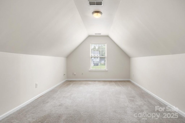4714 Adamshire Ave, Concord, NC 28025 - bonus room featuring carpet, vaulted ceiling, and baseboards