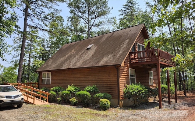 253 Nors Way Unit 26, Lake Lure, NC 28746 - view of side of home featuring a wooden deck and a shingled roof