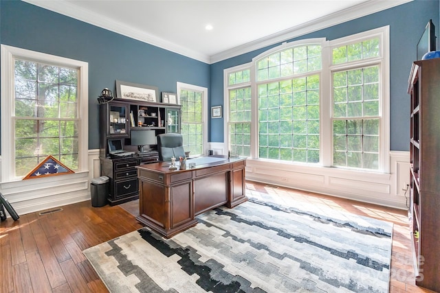 1868 Chestnut Hill Dr, Tega Cay, SC 29708 - office area featuring a wainscoted wall, light wood-style flooring, ornamental molding, and a decorative wall