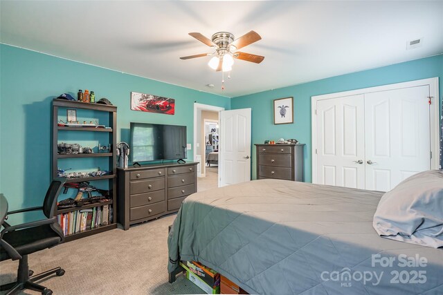 1868 Chestnut Hill Dr, Tega Cay, SC 29708 - bedroom featuring light colored carpet, a closet, and ceiling fan