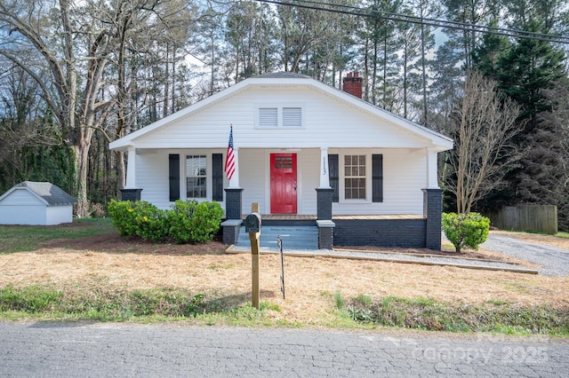 113 Elwood St, Kannapolis, NC 28081 - view of front of house with a chimney and covered porch