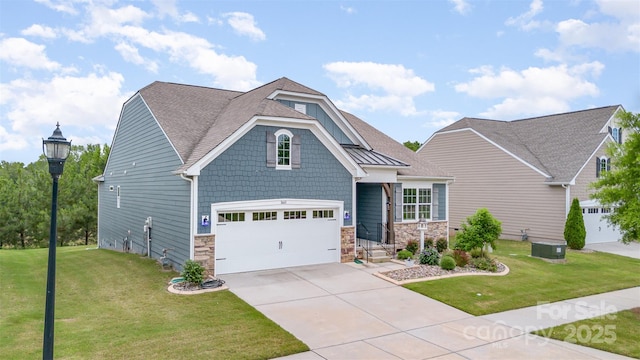 1663 Tranquility Blvd, Lancaster, SC 29720 - craftsman inspired home with driveway, a front yard, a garage, and stone siding