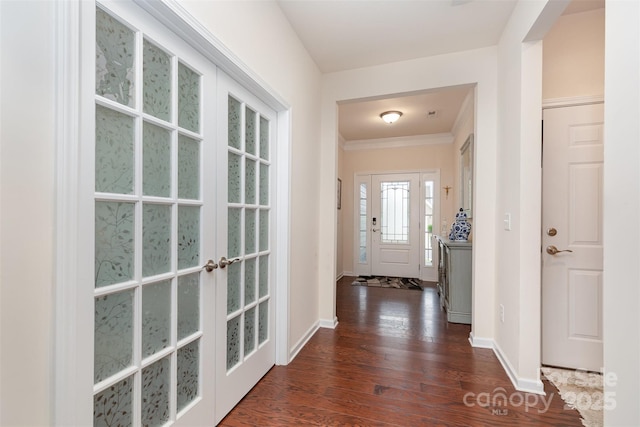 1663 Tranquility Blvd, Lancaster, SC 29720 - entrance foyer featuring dark wood finished floors, baseboards, and crown molding