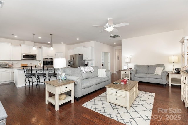 1663 Tranquility Blvd, Lancaster, SC 29720 - living area featuring a ceiling fan, dark wood-style flooring, and recessed lighting