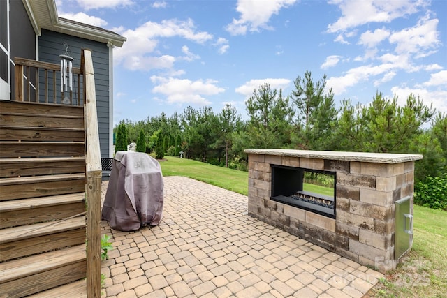 1663 Tranquility Blvd, Lancaster, SC 29720 - view of patio with an outdoor stone fireplace