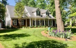 390 Robinson Rd, Mooresville, NC 28117 - view of front of home with a front lawn