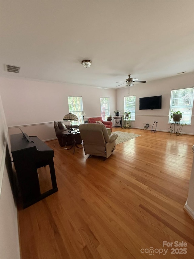 390 Robinson Rd, Mooresville, NC 28117 - living area featuring wood finished floors and ceiling fan