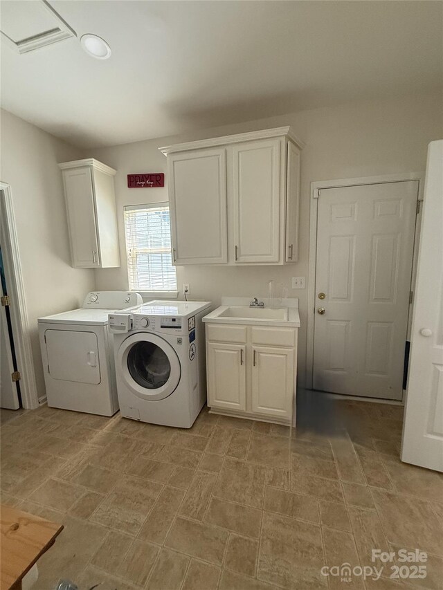 390 Robinson Rd, Mooresville, NC 28117 - washroom featuring separate washer and dryer and cabinet space