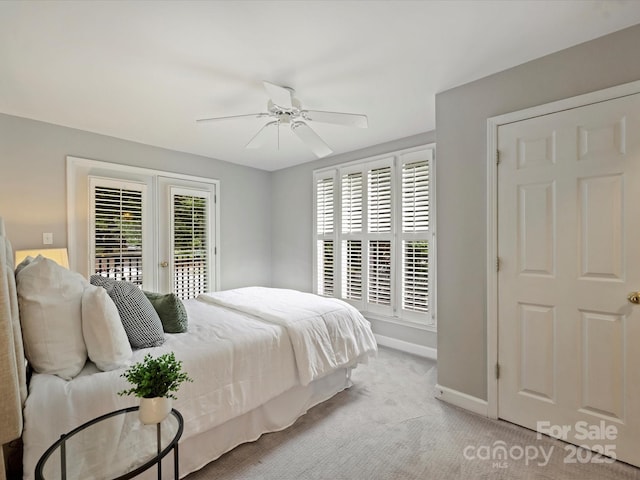 416 Queens Rd Unit 10, Charlotte, NC 28207 - carpeted bedroom with access to exterior, baseboards, and a ceiling fan