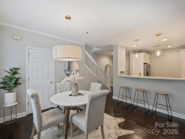 416 Queens Rd Unit 10, Charlotte, NC 28207 - dining area with stairs, dark wood-style flooring, baseboards, recessed lighting, and crown molding
