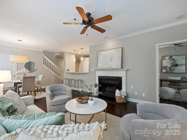 416 Queens Rd Unit 10, Charlotte, NC 28207 - living area with a ceiling fan, crown molding, baseboards, wood finished floors, and a fireplace