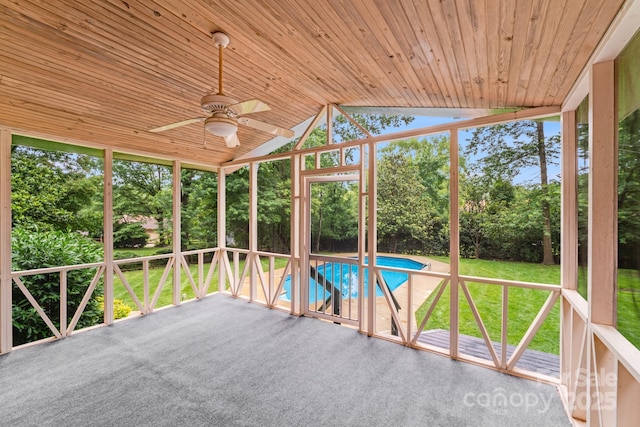 16512 Kimbolten Dr, Huntersville, NC 28078 - unfurnished sunroom featuring ceiling fan, vaulted ceiling, and view of wooded area
