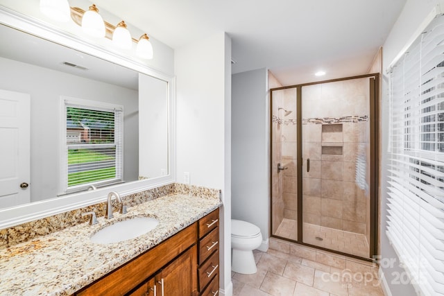 16512 Kimbolten Dr, Huntersville, NC 28078 - bathroom with vanity, toilet, a stall shower, and tile patterned floors
