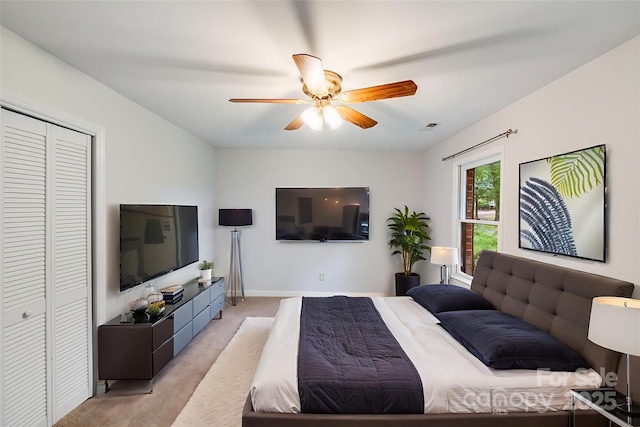 16512 Kimbolten Dr, Huntersville, NC 28078 - bedroom with light carpet, a closet, ceiling fan, and baseboards