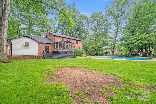16512 Kimbolten Dr, Huntersville, NC 28078 - view of green lawn featuring a sunroom, an outdoor pool, stairway, and an AC wall unit
