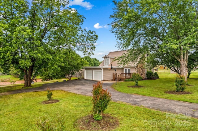 296 Hicks Creek Rd, Troutman, NC 28166 - obstructed view of property with driveway, a front yard, and a garage