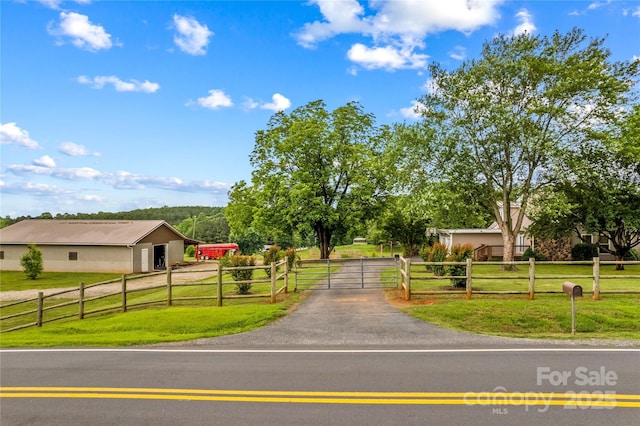 296 Hicks Creek Rd, Troutman, NC 28166 - view of front of house featuring a gate and asphalt driveway