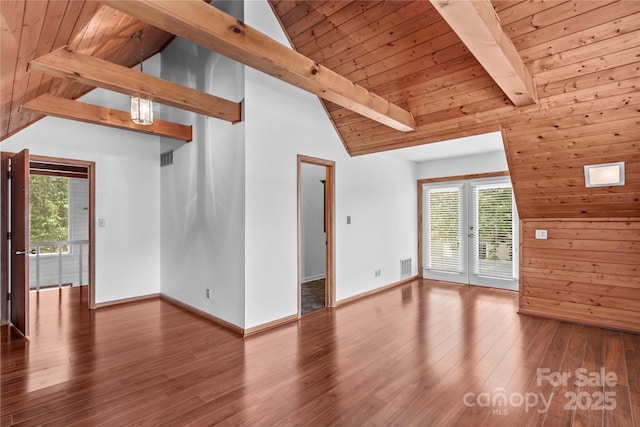 296 Hicks Creek Rd, Troutman, NC 28166 - unfurnished living room with wood finished floors, plenty of natural light, baseboards, and wooden ceiling