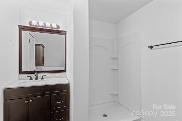 296 Hicks Creek Rd, Troutman, NC 28166 - bathroom featuring vanity and a stall shower