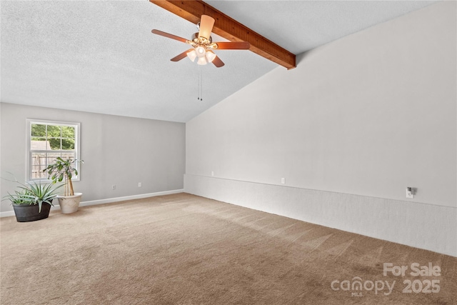 296 Hicks Creek Rd, Troutman, NC 28166 - spare room featuring carpet floors, a ceiling fan, a textured ceiling, and baseboards